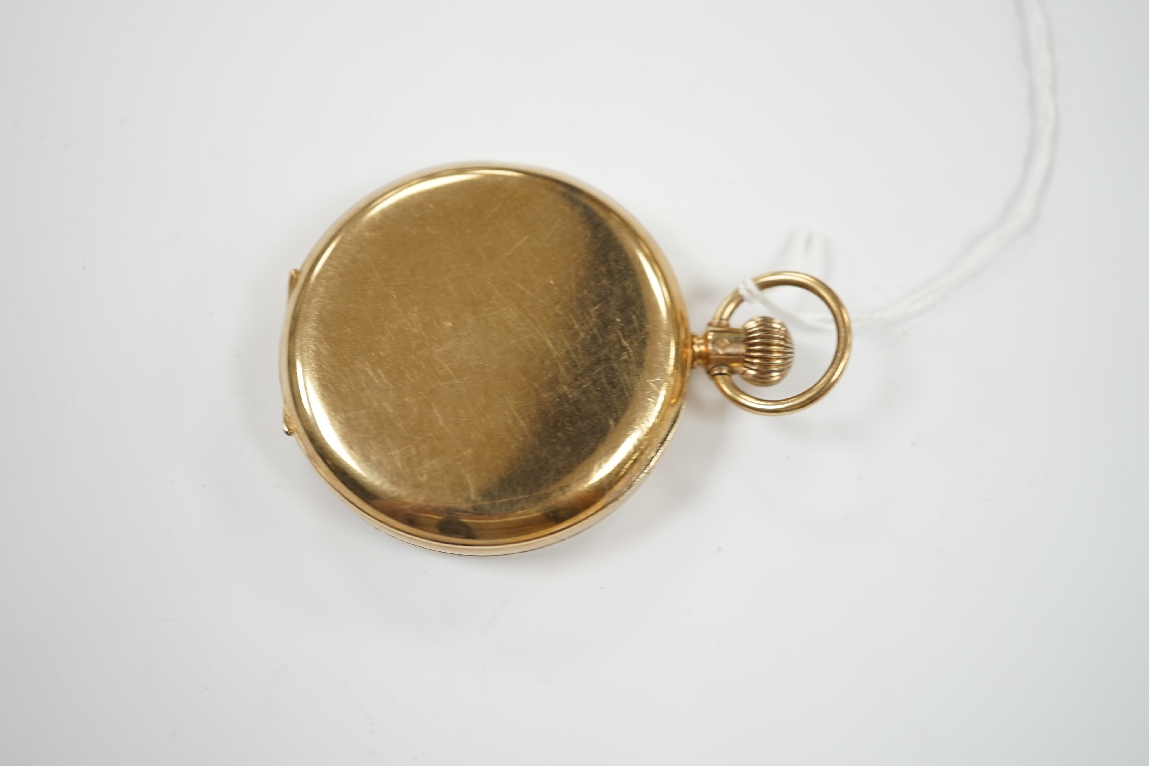 A George V 9ct gold open face keyless pocket watch, with Roman dial and subsidiary seconds, case diameter 50mm, gross weight 91.7 grams.